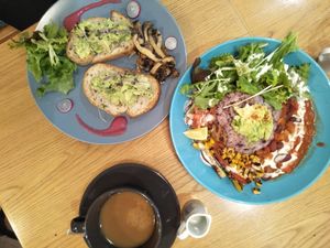 Avocado toast with auromatic mushrooms and mexican beans bowl...! Feels just like home. at Healthy Penguin Cafe in Matsumoto