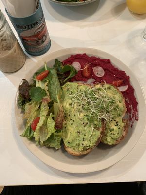 Avocado toast with beet hummus and salad - so good!  at Healthy Penguin Cafe in Matsumoto