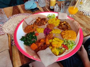 Two vegan plates on one plate at Gezana Eritrean Restaurant in Eindhoven