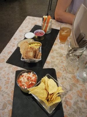 Nachos and humus with veg dish at La Reciclaria in Vic