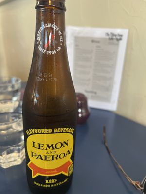 L&P out of case. Hubby had a milkshake that he said was mostly milk, very little ice cream .  at The Olive Tree Cafe in Te Anau