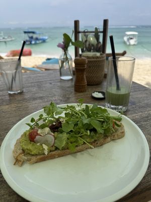 Vegan avocado on toast (with vegan feta and sun roasted tomatoes😍)  at Ginger & Jamu in Lembongan