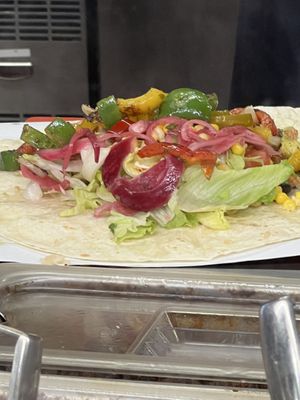 Burrito prep; I love the spicy peppers!   at Burrito Loco - Spalena in Prague