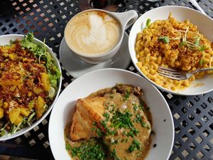 Golden beet salad, crossaint and gravy, smoky mac, vanilla bean latte at Fox & Fig in Savannah