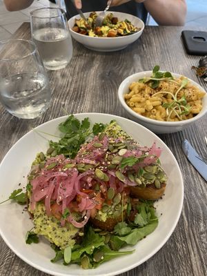 Avo toast, side of mac and the proper breakfast in the back! at Fox & Fig in Savannah