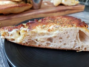 Cashew Cheese Garlic Bread slice at Fox & Fig in Savannah
