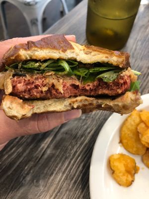 Beyond Meat Burger with delicious pretzel bun and caramelized onions at Fox & Fig in Savannah