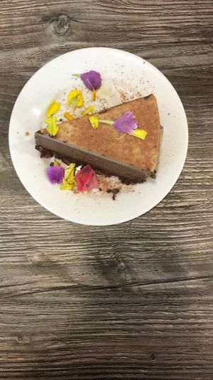 Terimisu with edible flowers at Fox & Fig in Savannah