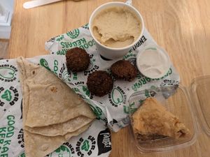 Baklava, falafels and hummus, bread at What The Pitta in North West London