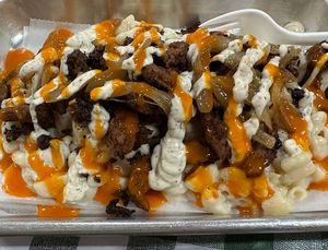 Loaded mac (add bacon, caramelized onions, ranch, Buffalo)  at Murray Hillbilly in Jacksonville