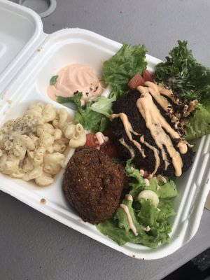 Ya’ Reckon on a salad with Mac n’ cheez and a hush puppy  at Murray Hillbilly in Jacksonville