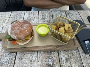 „Chicken“ Burger: does not look special but my husband said it was the best vegan burger he ever ate   at Wild Food in Granada