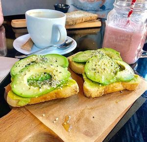 tostas de aguacate con smoothy  at Wild Food in Granada