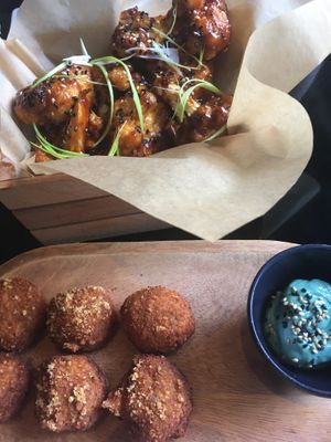 croquettes with spirulina aioli and kfc cauliflower! yum!! at Wild Food in Granada