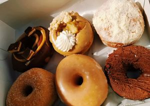 Cinnamon sugar, vanilla glazed, chocolate cake, peanut butter chocolate, apple pie, pumpkin creme at Revolution Doughnuts in Atlanta