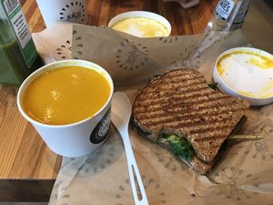 Carrot ginger soup and avocado panini  at Juice Press in Seattle