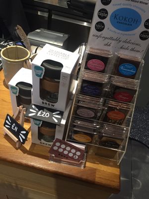 Reusable coffee cups & chocolate (some vegan) at Kalm Kitchen Cafe in Guildford