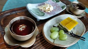 Desert - sweet drink (cinnamon, green plum or pumpkin sweet rice), dried tofu snack, fruit and cake at Ssukbujaeng-i 쑥부쟁이 in Gyeongju