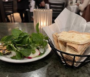 Bread and herbs for the table  at Shamshiri Grill in West Los Angeles