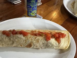 Tofu Burrito with Amazing homemade flour tortilla. The peppers and onions on the table were excellent too    at Ko-Ox Han Nah in San Ignacio