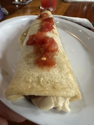 Tofu Burrito with Amazing homemade flour tortilla. The peppers and onions on the table were excellent too.   at Ko-Ox Han Nah in San Ignacio