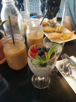 Vegan ice coffee vegan coconut chia pudding and vegan empanadas in back at Makers & Finders - Arts District in Las Vegas