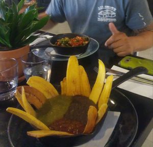 Vegan Beans and salsa with plantain chips and vegan hash in the back at Makers & Finders - Arts District in Las Vegas