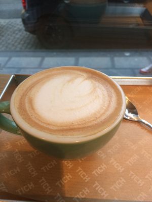 Almonccino using their house-made almond milk. I highly reccomend if you like almond flavour.  at TICH Healthy Living in Brussels