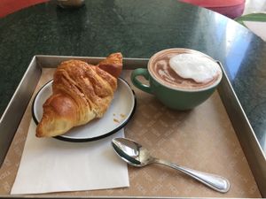 Croissant and hot chocolate at TICH Healthy Living in Brussels