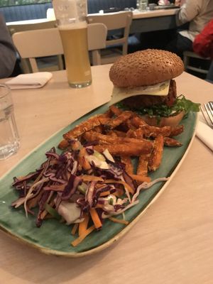 Fried switch burger with sweet potato fries and house slaw at Nourish in Bath