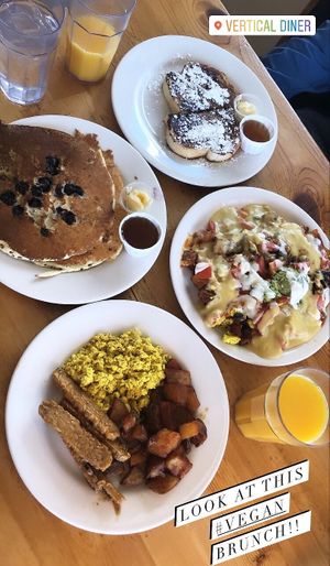 Pancakes, french toast, tofu eggs, tempeh bacon, hash with veggies and cheeze. at Vertical Diner in Salt Lake City