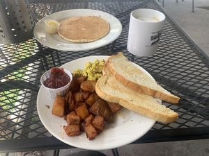 Soy latte, breakfast plate with tofu scramble, potatoes and toast, and an ala carte pancake   at Vertical Diner in Salt Lake City
