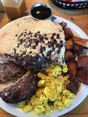 This was the Avalanche. Chocolate chip pancakes, tofu scramble, sausage patty, and hash browns. Divine. at Vertical Diner in Salt Lake City