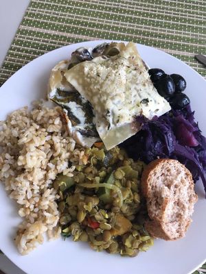 Mushroom and spinach lasagna (amazing) with red cabbage, rice and lentils YUM  at Bosque in Sintra