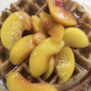 Feeling peachy waffle   at The Buzz Coffee & Cafe in Burnsville