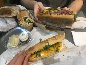 Caprese and Italian hoagies with pasta salad side and cupcake and whoopie pie from Flying Monkey Bakery at LUHV Vegan Deli in Philadelphia