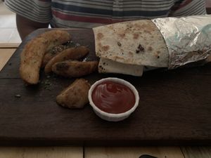 Veggie burrito and fries. at El Veggie SV - Food Truck in San Salvador