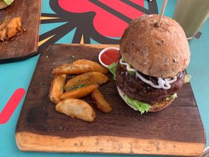 Falafel burger and fries.  at El Veggie SV - Food Truck in San Salvador