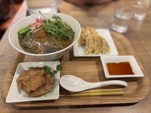Black sesame ramen + Char Siu + 6 Dumplings  at T's Tantan - JR Ueno in Tokyo