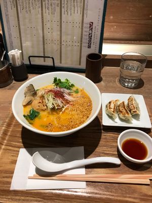Golden sesame ramen and gyoza  at T's Tantan - JR Ueno in Tokyo