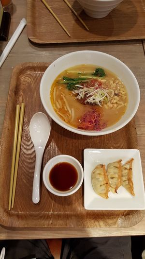 White sesame ramen with additional gyoza at T's Tantan - JR Ueno in Tokyo