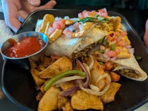 Breakfast burrito with potatoes 🤤 at Ale Mary's Beer Hall in Royal Oak
