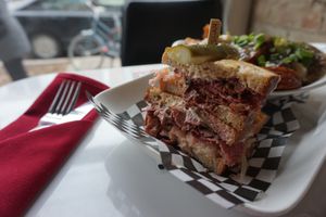 Reubenator with poutine side at Mythology in Toronto
