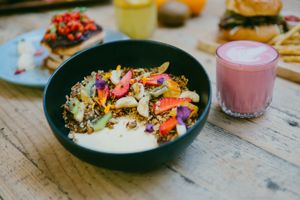 Granola with Passionfruit panda cotta and fresh fruit. Vegan, vegetarian, dairy free and tasty.  at Yonder in Queenstown