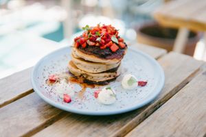Strawberries and cream pancakes. Vegan, vegetarian, gluten-free and dairy free. oh, they also taste great!  at Yonder in Queenstown