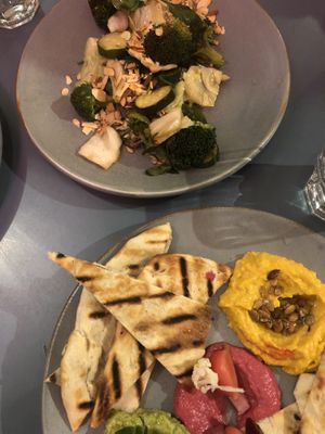 Hummus plate with pita bread and greens plate - all vegan 🥰 at Yonder in Queenstown