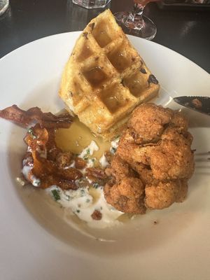 Chkn fried cauliflower and waffles with carrot bacon 🤌🏼  at City O' City in Denver