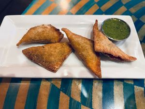 Ravioli — crispy wontons stuffed with vegetables and cashew cheese at City O' City in Denver