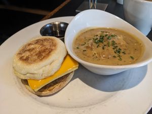 Sausage egg and cheese sandwich, side of biscuits and gravy (all vegan) at City O' City in Denver