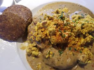 Biscuits and gravy with scrambled tofu and a side of breakfast "sausage" at City O' City in Denver